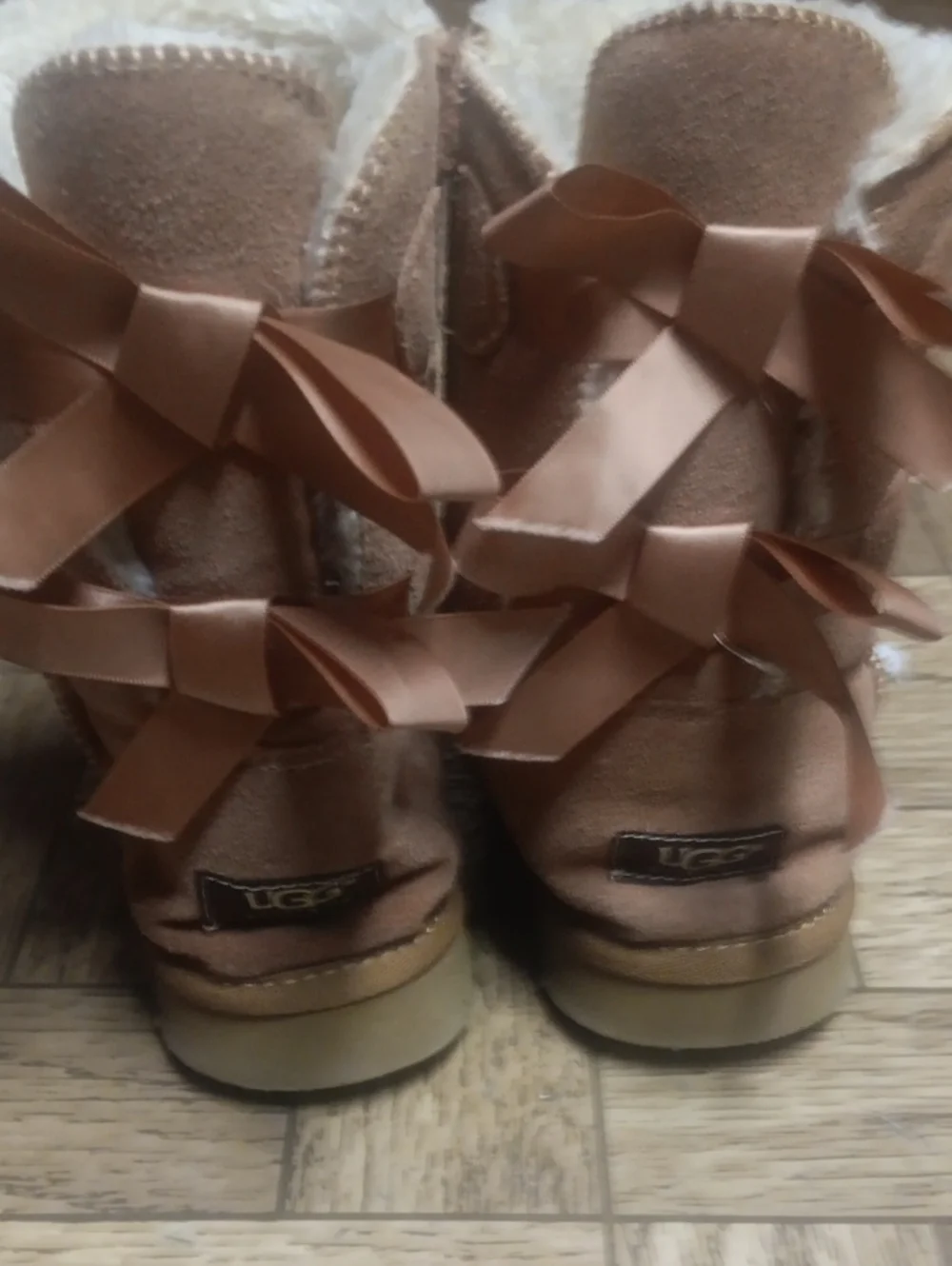 UGG Shearling-Lined Boots with Ribbon Bows